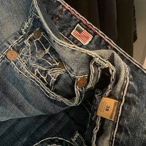Mens Jeans/ True Religion size 38. Blue with white stitching. Used